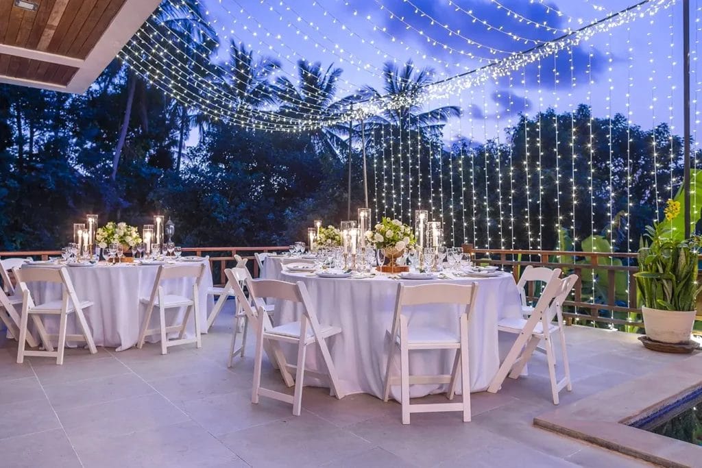 Wedding reception area with streams of light around.