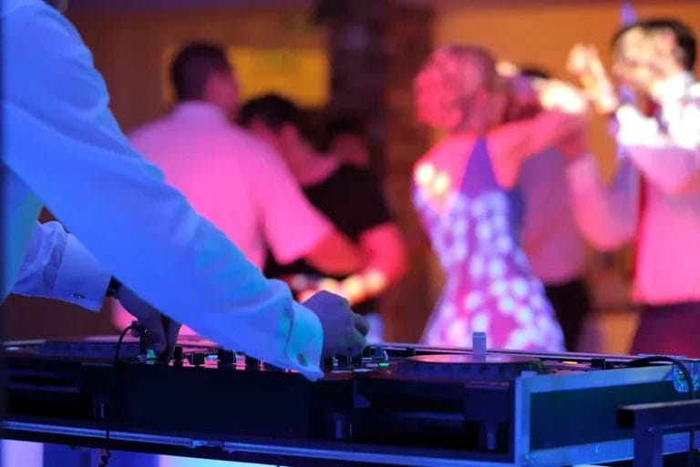 DJ at a wedding dance party.