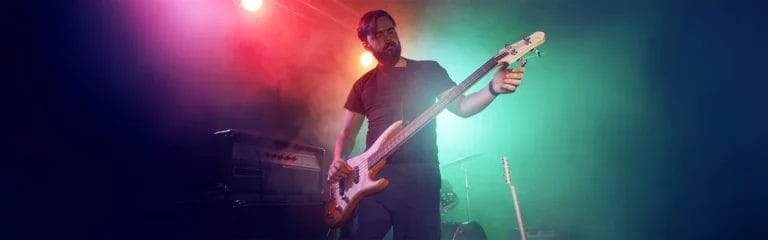 Bassist warming up on stage