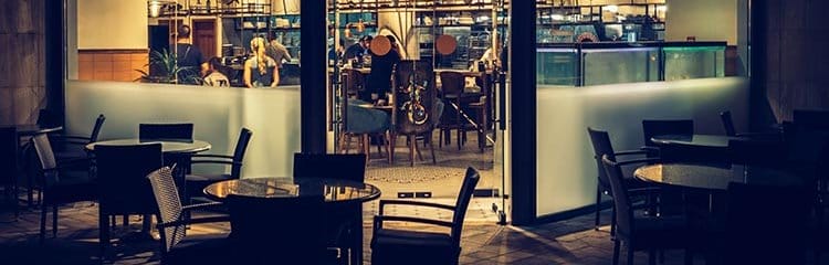 view of empty patio tables at a restaurant