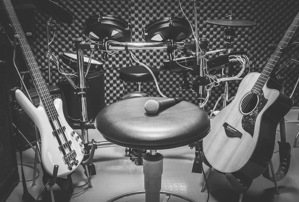 Black and white image of instruments in a recording studio.