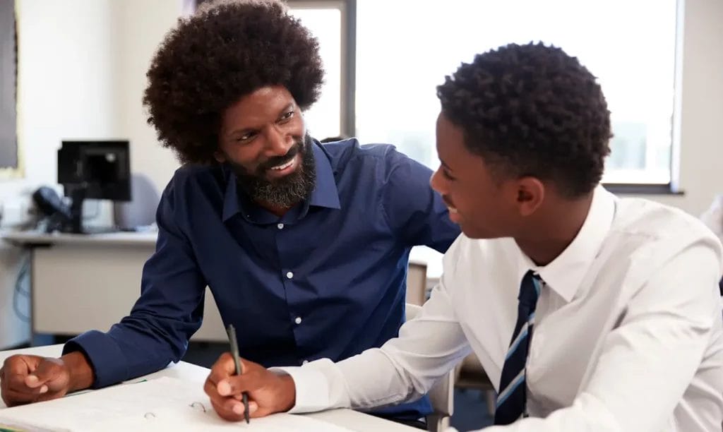 A tutor and student going over course material.