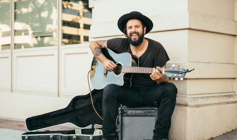 Street performer playing guitar