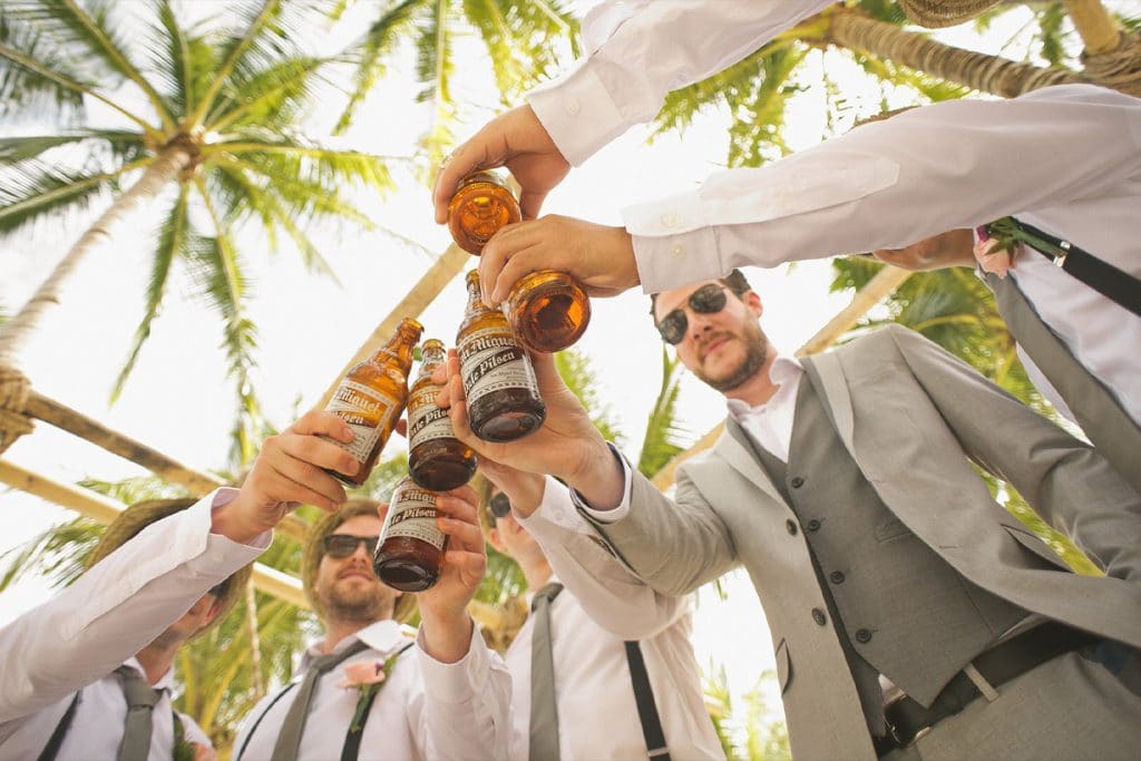 groomsmen cheersing