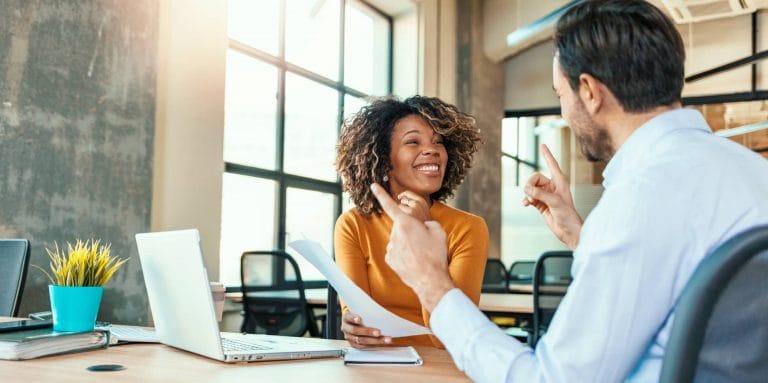 two people meeting in an office space