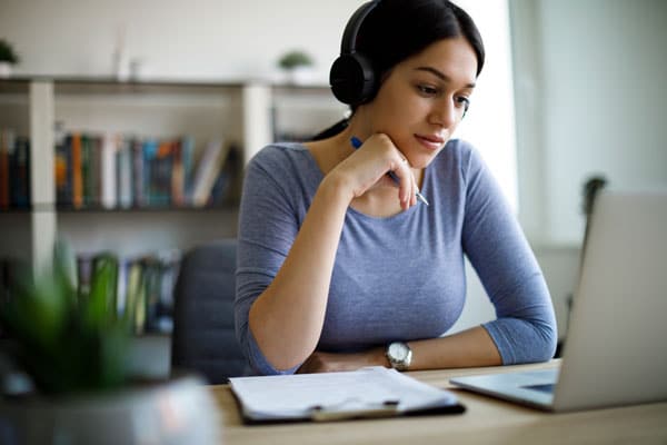 tutor working at a computer