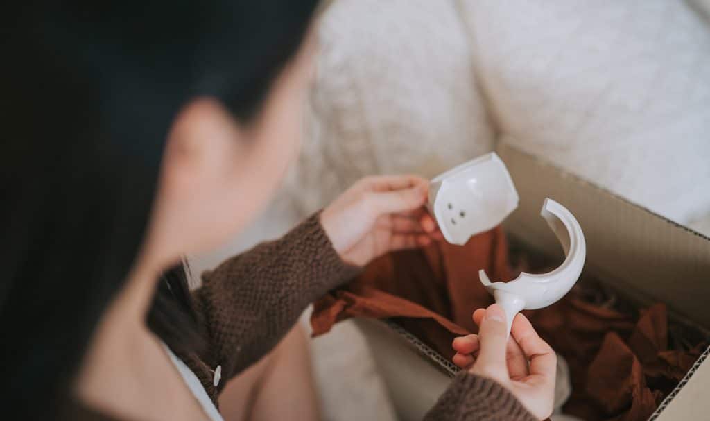 Woman opens package to find broken pottery, but the Etsy seller has product liability insurance.