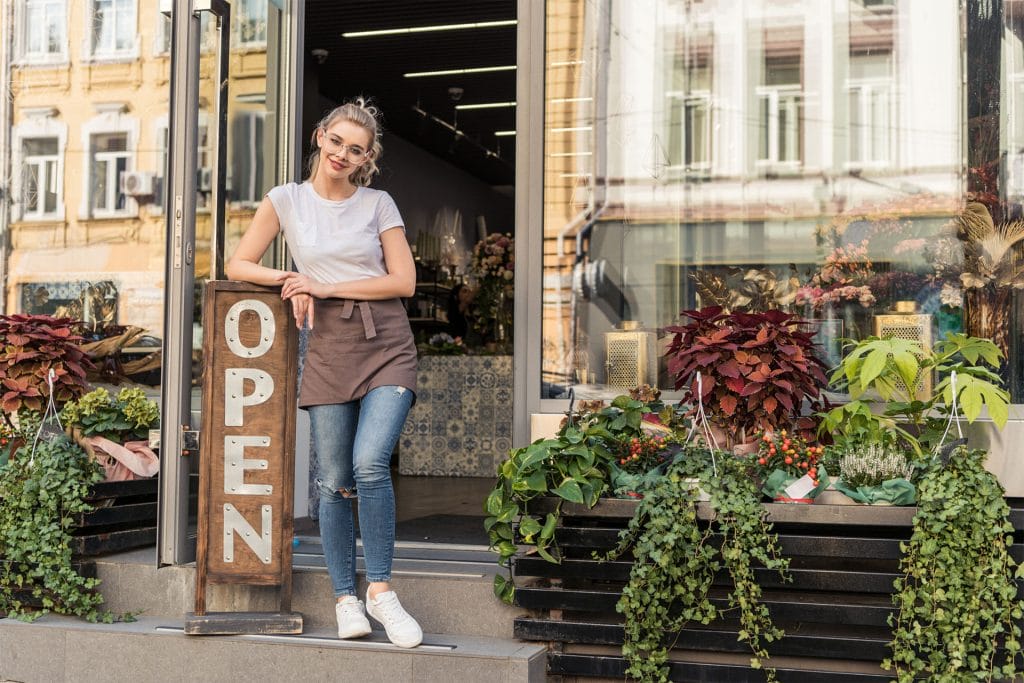 A woman opens a store