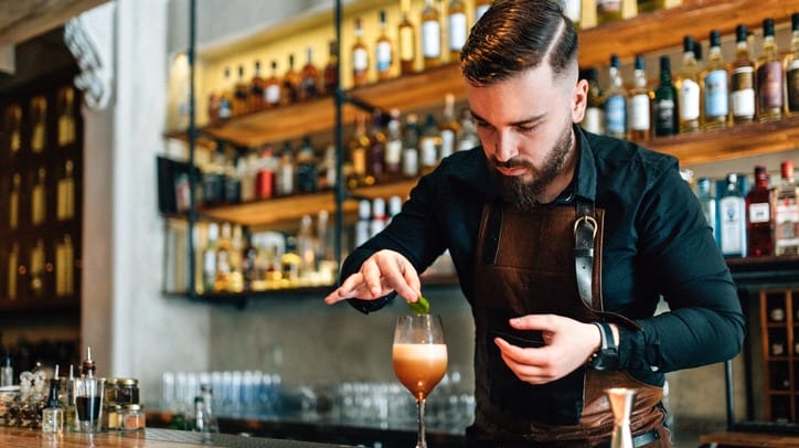 bartender preparing a cocktail