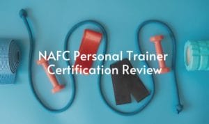 Workout equipment is placed on a blue background with the words "NAFC Personal Trainer Certification Review" written over top of the image.