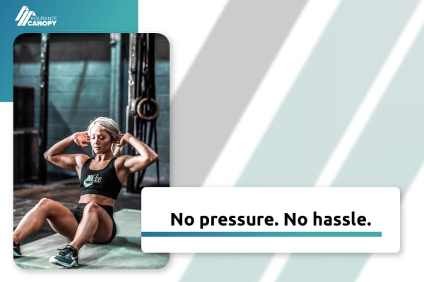 A personal trainer does situps.