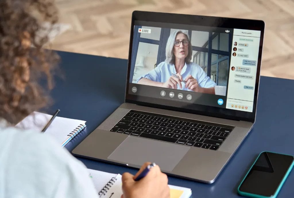 Online tutor meeting with a student