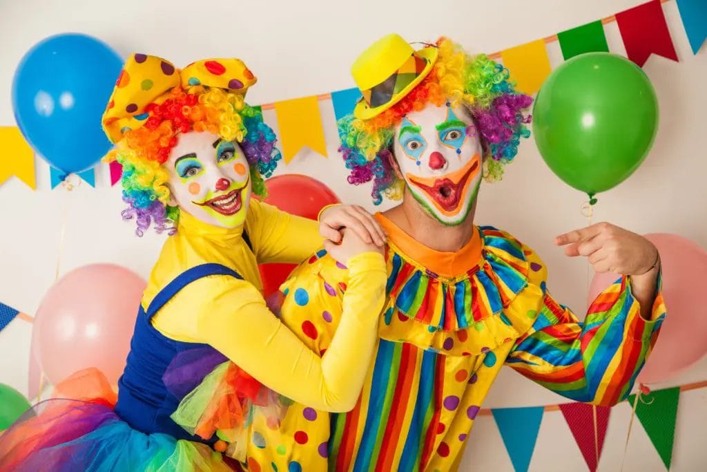two cheerful clowns at a birthday party for children