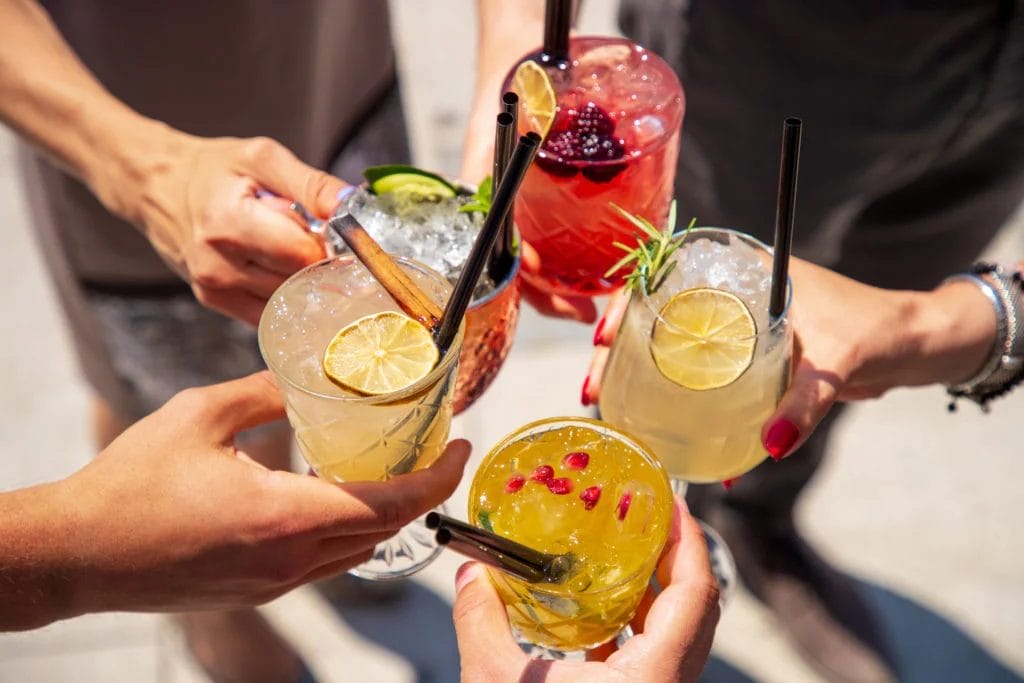 group of people with alcoholic beverage