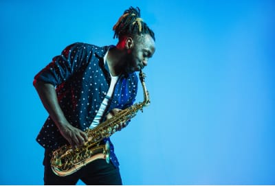 man playing saxophone