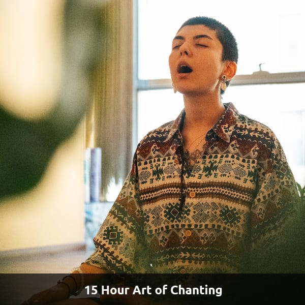 A yoga practitioner chants in meditation, text reads: 15 Hour Art of Chanting