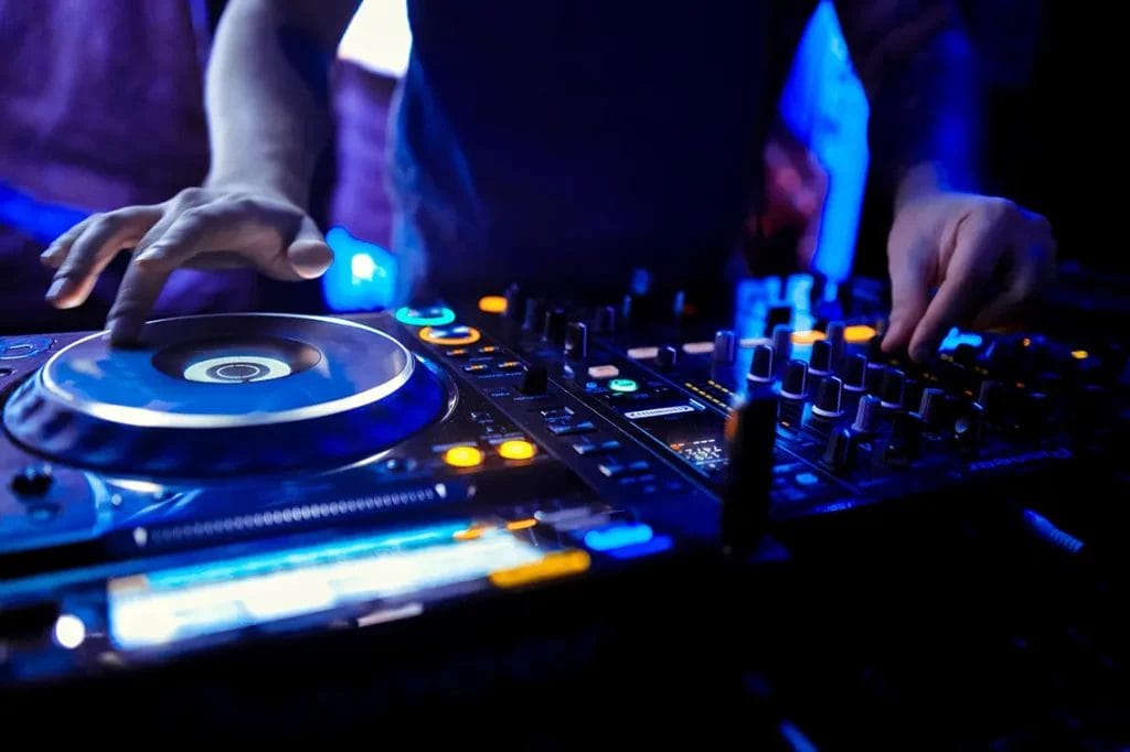 DJ at a club with turntable