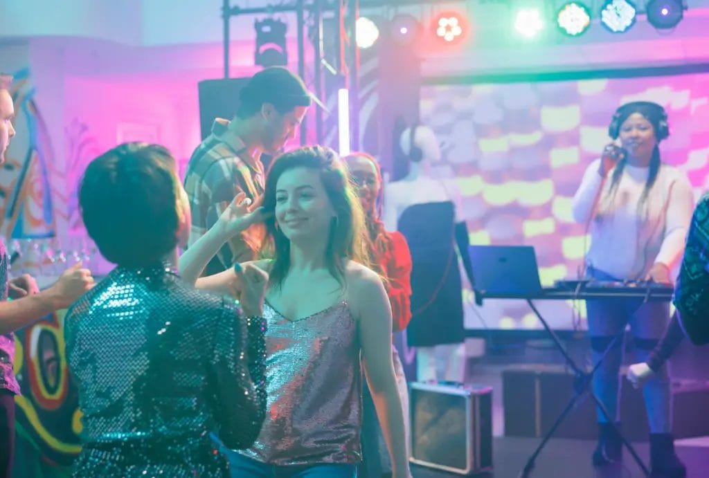 A DJ spinning tracks at a club.
