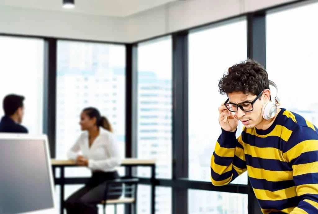 A DJ setting up for a corporate party.