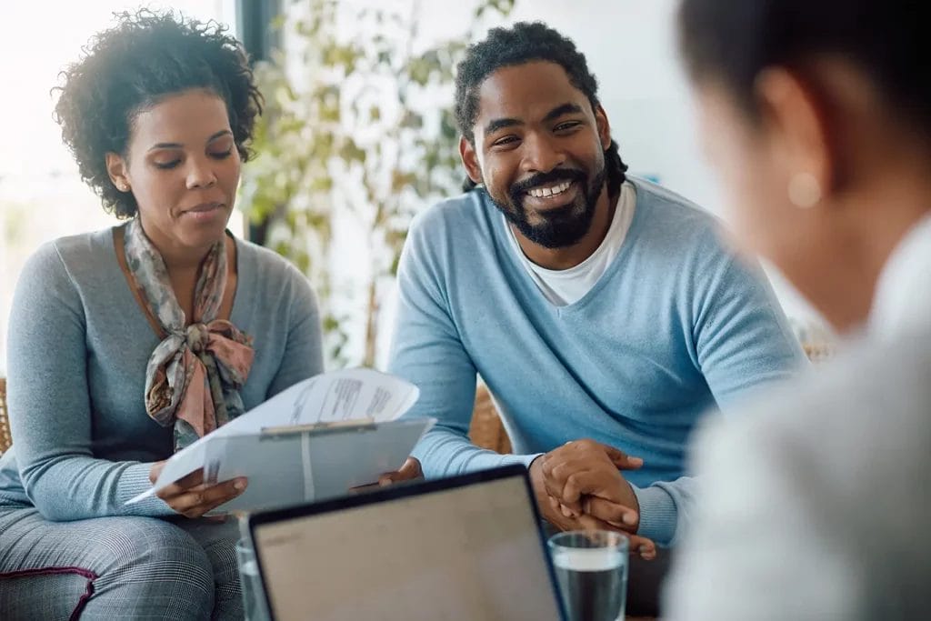 A couple meeting with a life coach.