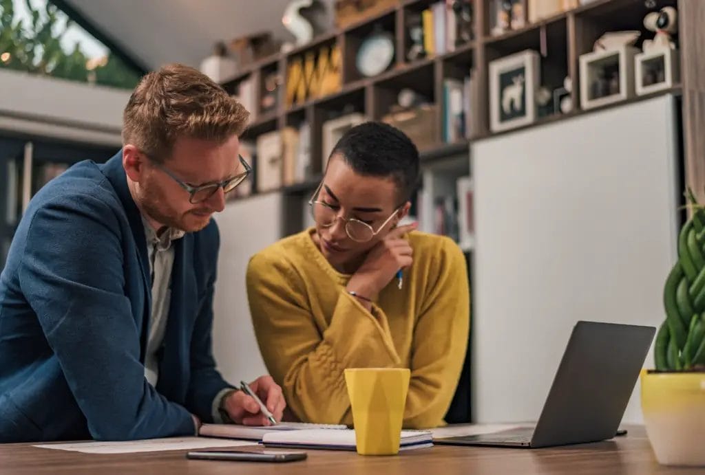Life coach and client work together during an in-home session.