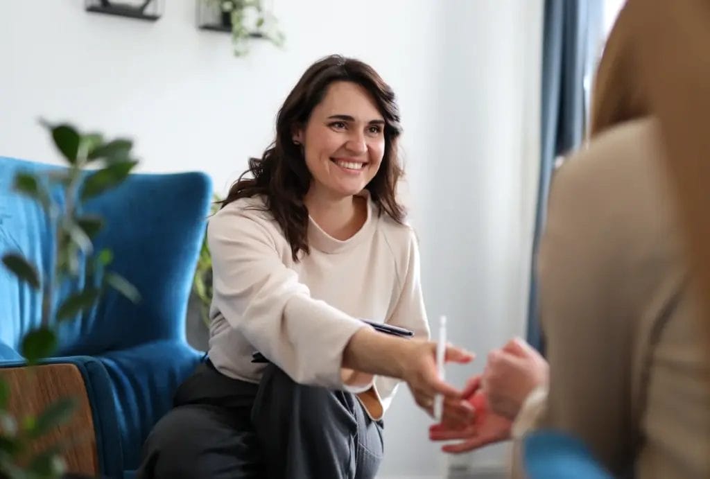 Life coach introducing themselves at an introductory session