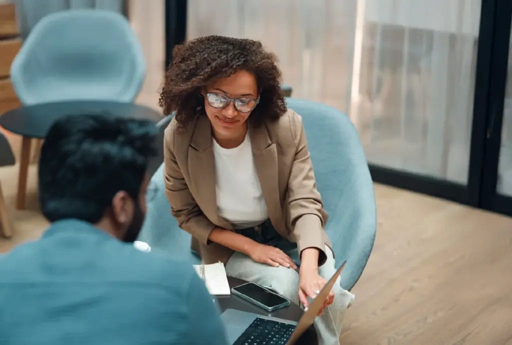 Coach working with client in a session