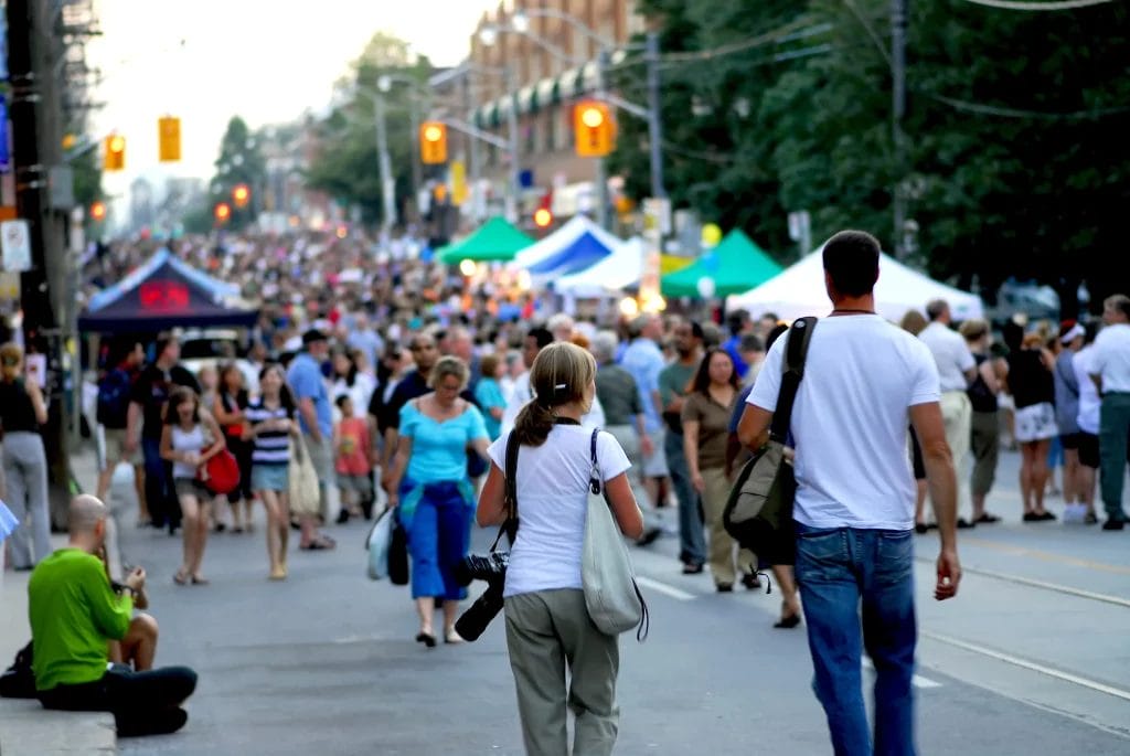 Street festival filled with vendors.