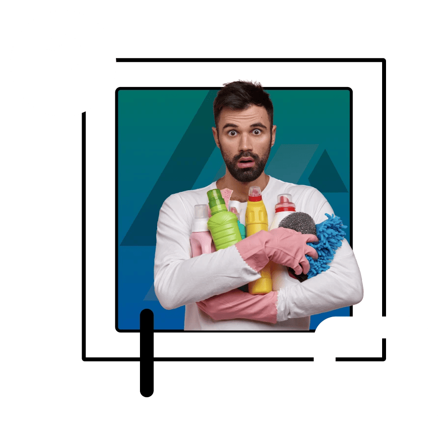 Worried man holds on to multiple cleaning products as he stares directly into the camera with wide eyes