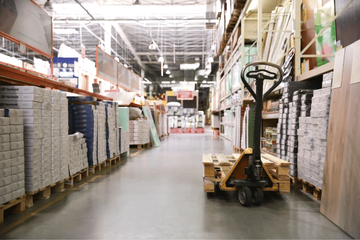 A wholesale store with a pallet jack.