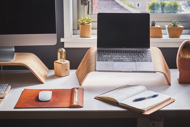 an open laptop on a nicely organized desk