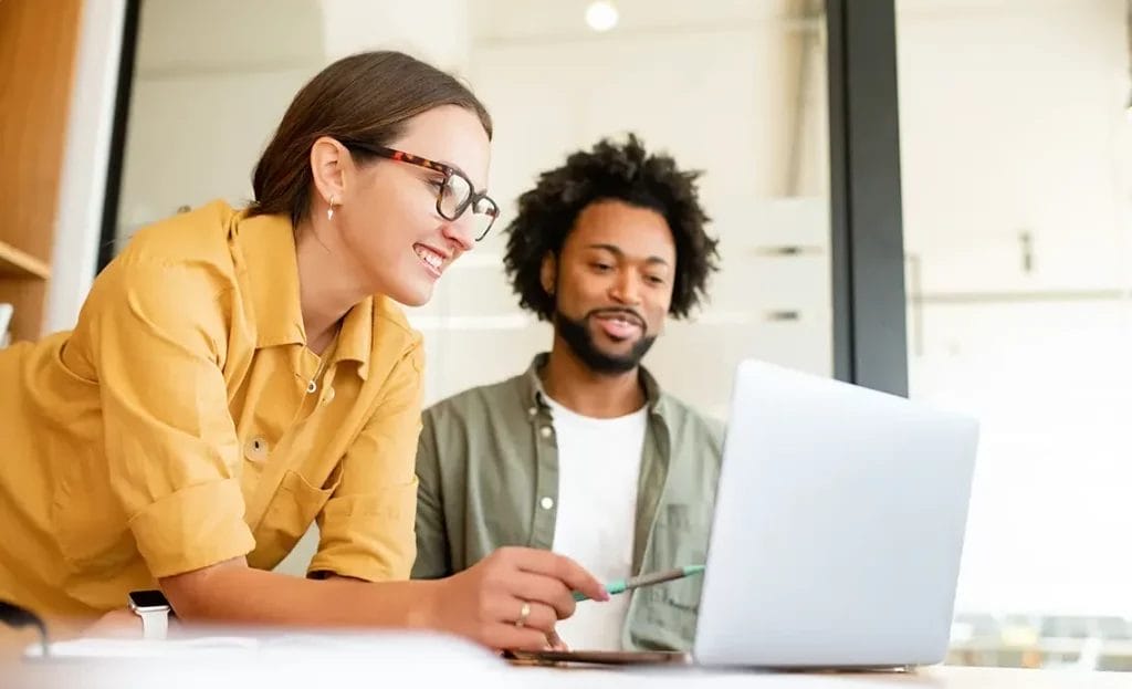 Mentor with mentee at a meeting