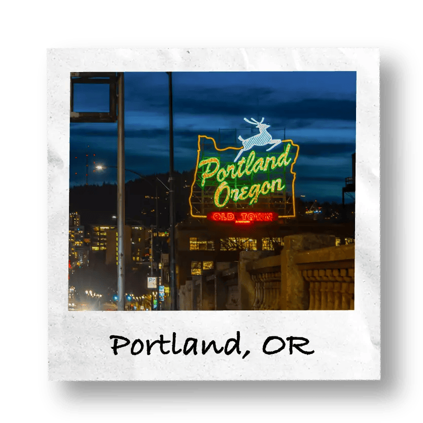 Portland, OR sign at night.