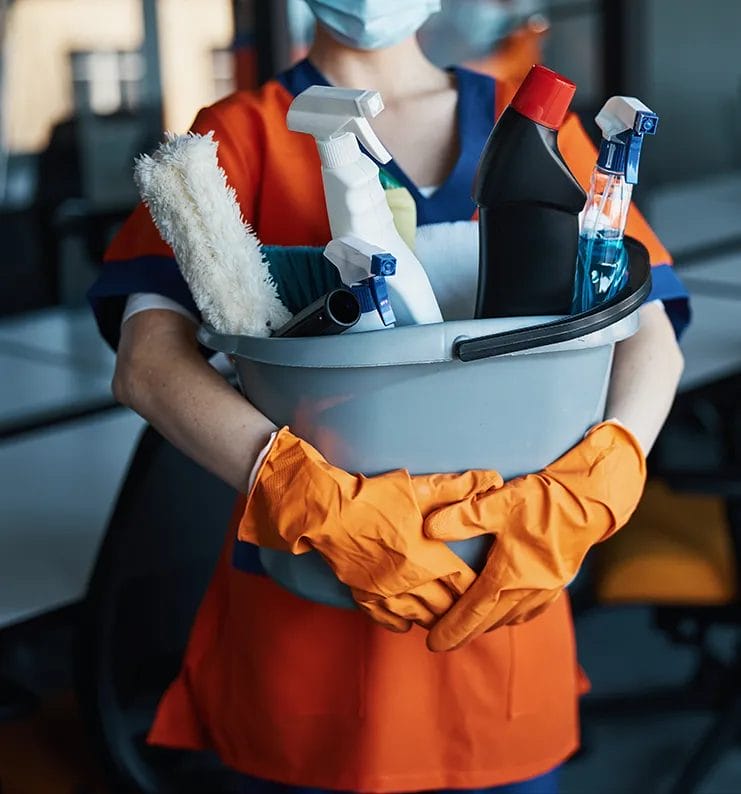 image of a lady holding a cleaning bucket