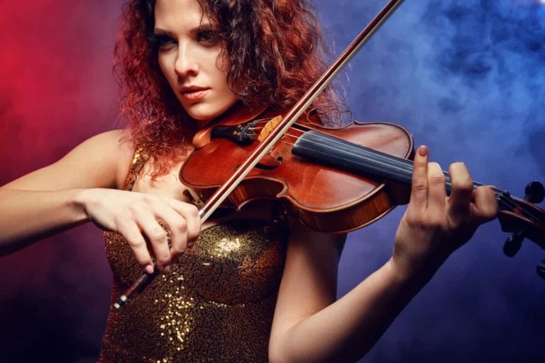 A violinist playing a live show