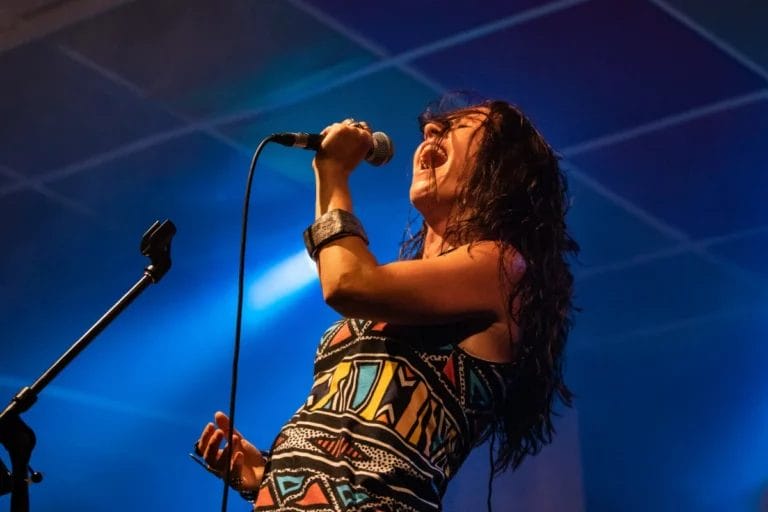 A musician performing on stage.