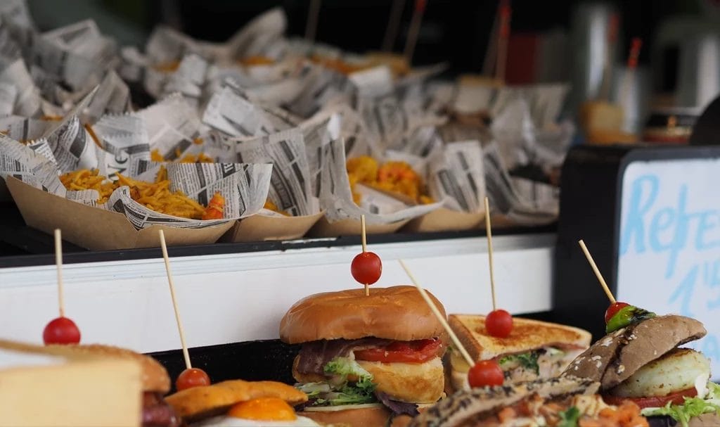 A look at a home decor booth at a large indoor home expo.