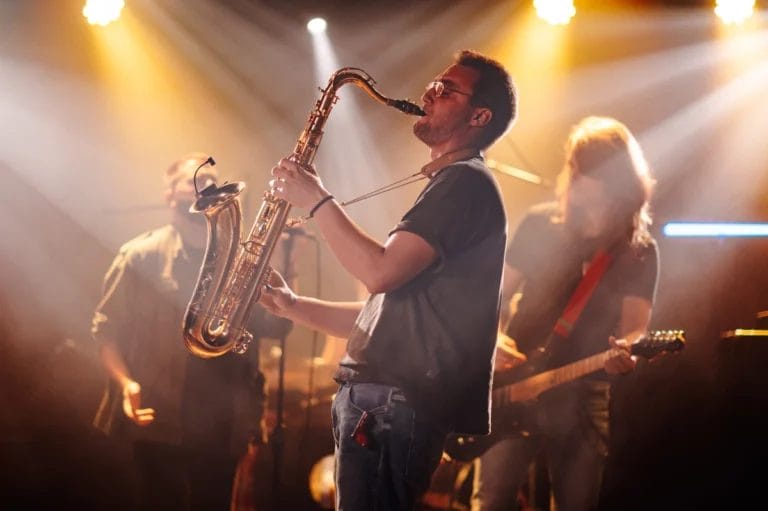 Musicians jamming out on stage.