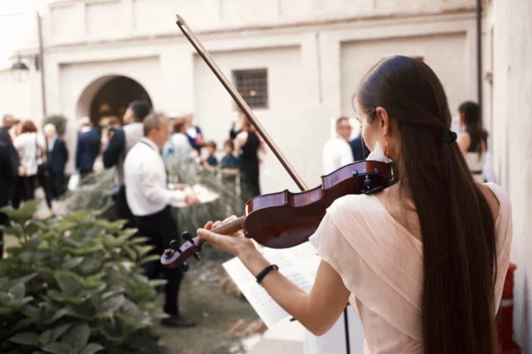 A violinist playing at a wedding.