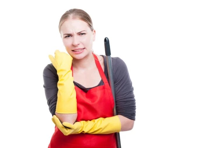A woman cleaner with an elbow injury.