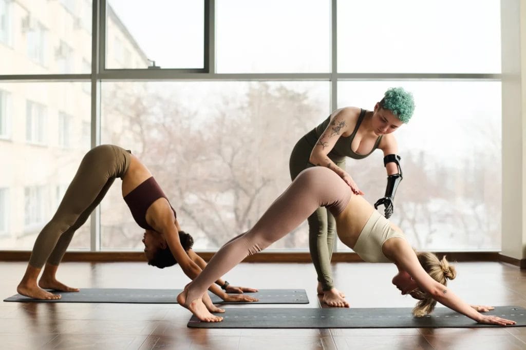 Woman teaching yoga class