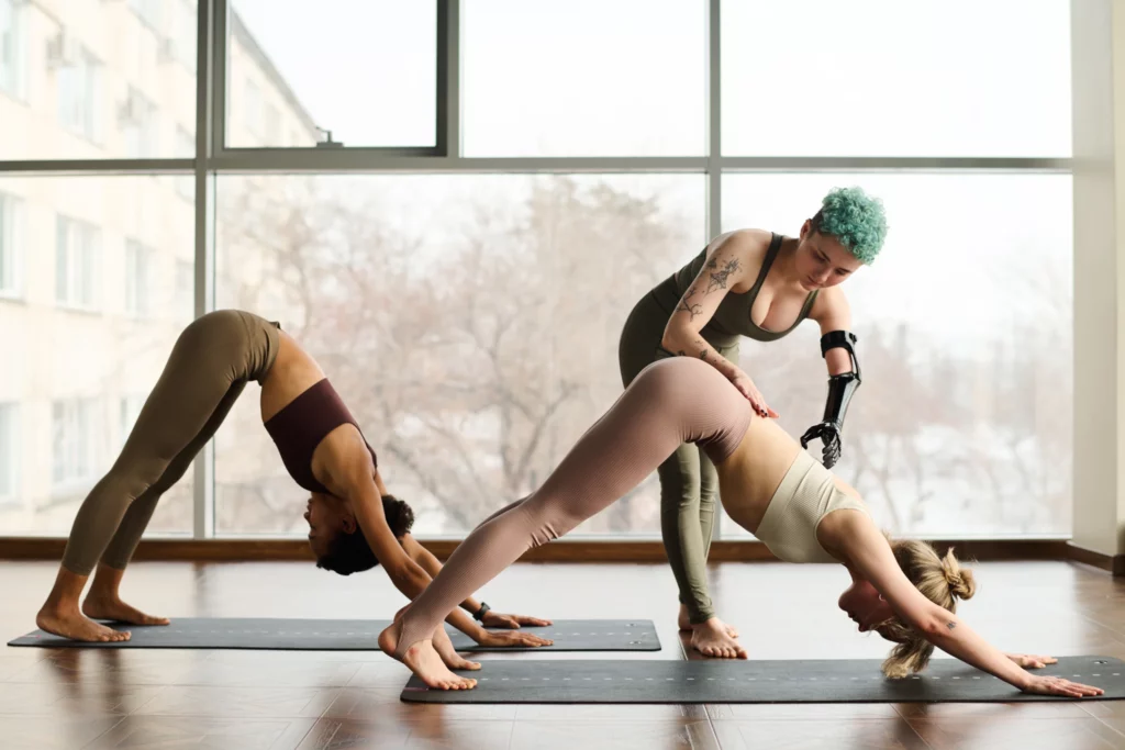 Woman teaching yoga class