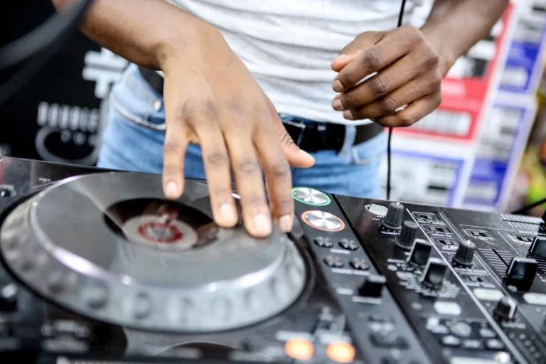 DJ mixing at an outdoor gig.