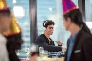 A DJ at a corporate party spinning tracks